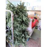 Pallet containing various Christmas decoration parts and stillage of odd Christmas tree sections and