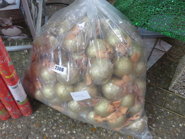 Bag of gold glittering baubles