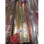 3 rolls of Christmas wrapping paper
