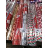 3 rolls of Christmas wrapping paper