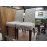 Pair of cream flower patterned dining chairs