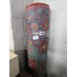 Red and blue figured and bordered rug