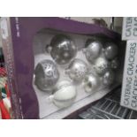 10 hand decorated glass Christmas ornaments in silver and white