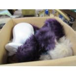 Crate of fur head scarves