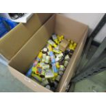 Box containing various Tetra aqua safe chemicals and Tetra fish flakes