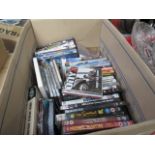 Box containing CDs and DVDs