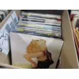 (5) Box containing roughly 60 records of Madonna