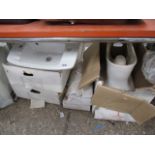 Bay containing 5 ceramic sinks and ceramic toilet