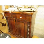 Mahogany double door cupboard with bobbin turned details