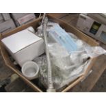 Box containing mixed plumbing items