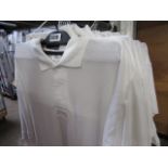 Quantity of white polo shirts