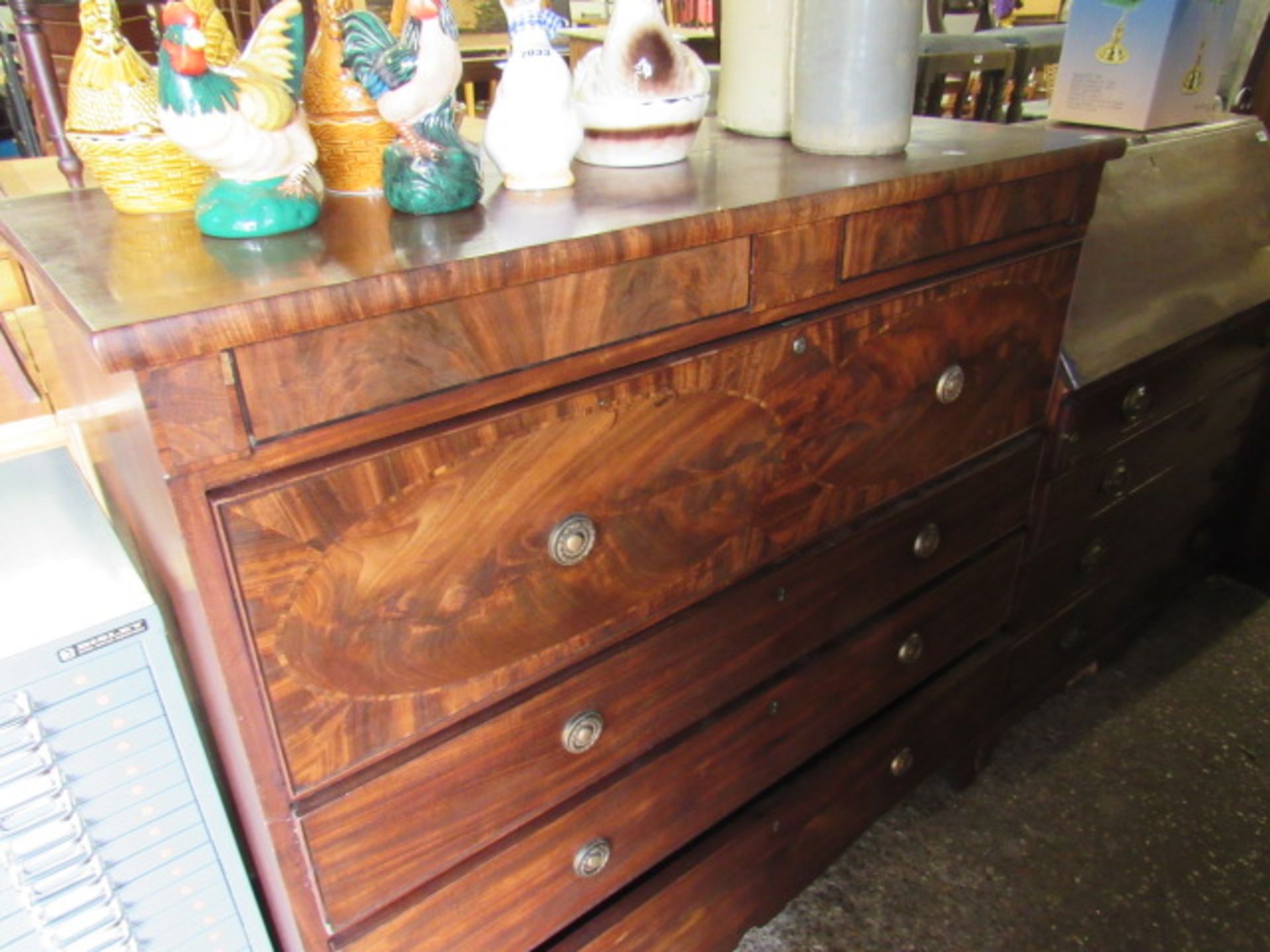 Mahogany and walnut chest of 4 drawers