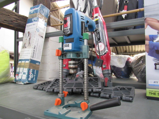 Powerbase electric drill on stand