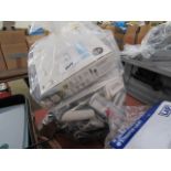 Bag containing Yale Smart Living Home starter kits, Yale accessories, dummy cams, etc.