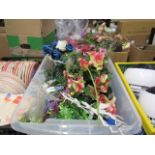 Crate of artificial flowers