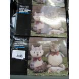(2364) 2 boxes of festive fox and squirrel door stops