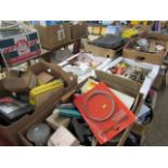 Tabletop of 10 boxes of various hardware tools and equipment