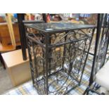 Wrought iron wine rack with lockable doors and glass top