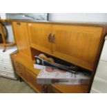 Teak G-Plan sideboard with cupboards over drawers and cupboards