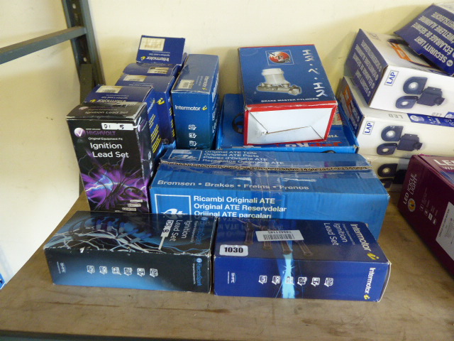 Quantity of car parts incl. ignition lead sets, brake cylinder, timing belt kits, etc.