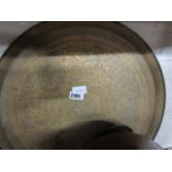 Beaten brass platter with middle Eastern decoration