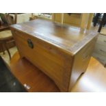 Oak carved lift top blanket box with brass fitting