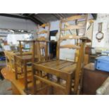 Pair of Ercol ladder back carver chairs