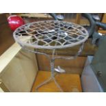 Wrought iron garden table with decoration