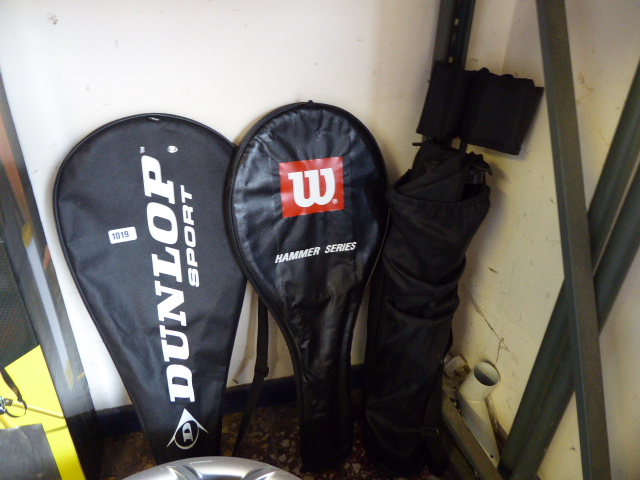 2 tennis rackets with folding camping chair