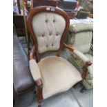 Stained beech armchair with brown fabric seat and back