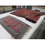 Red bokhara style carpet plus a mat