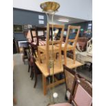 Brass finished mother and child floor lamp