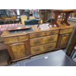 Walnut sideboard, cupbaords to the side with central drawers