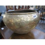 Brass pot with floral pattern