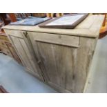 Stripped pine double door cupboard