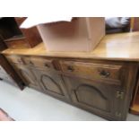 Dark oak sideboard, 3 drawers over 3 doors