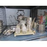 Cage containing a spirit kettle, cruet sets, dishes and a silver plated tea service