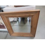 Square bevelled mirror in pine frame