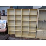 Pair of pine finished open fronted bookcases