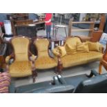 Carved Edwardian settee in gold floral fabric with scatter cushions plus pair of his and hers chairs