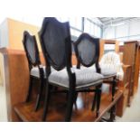 4 black painted dining chairs with shield backs