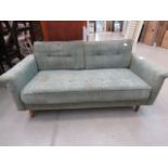 Green fabric 1950s 2 seater sofa, (Collectors Item)