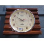 Faux walnut manix quartz wall clock