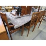 Teak Meredew extending dining table plus 6 chairs to include 2 carvers