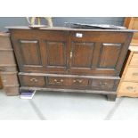 Oak double door cabinet with 3 drawers under