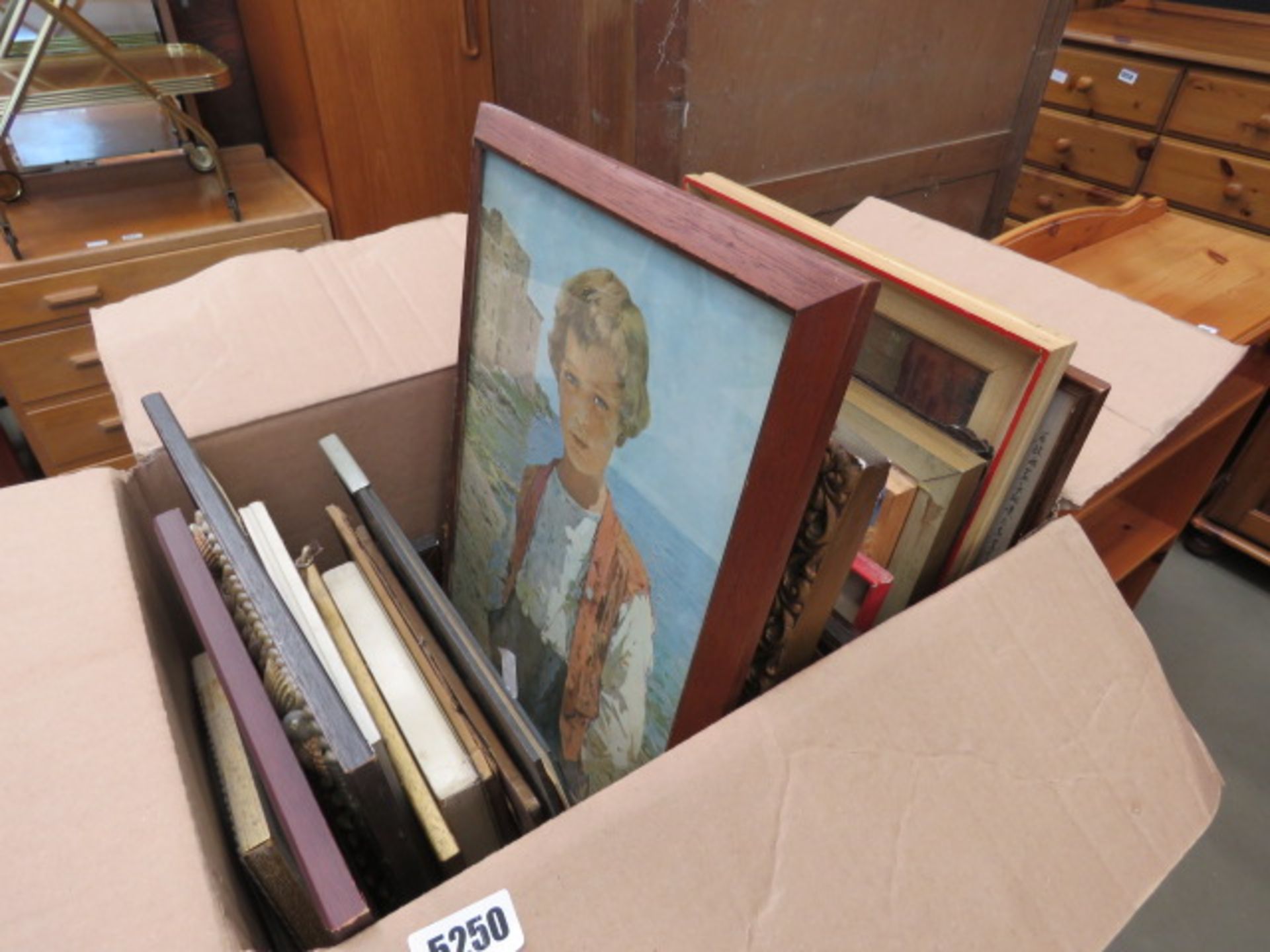 Box containing a qty of picture frames, rural paintings and prints