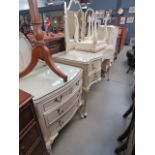 Cream painted French bedroom suite comprising headboard, dressing table and stool, plus chest of 5