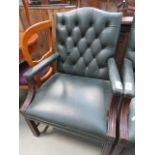 Green leather effect button back arm chair