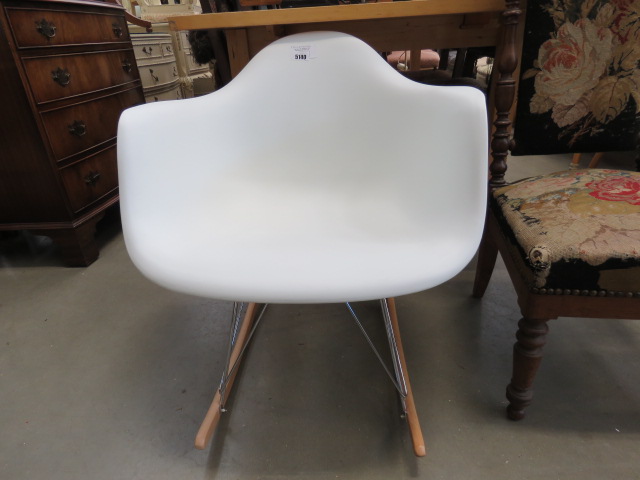 Moulded plastic rocking chair