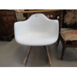 Moulded plastic rocking chair